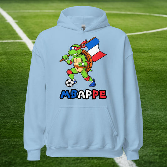 Kylian Mbappe Ninja Turtle Funny Football Euro 2024 France Soccer Unisex Hoodie Light Blue Hoodies Football Kylian Mbappe Ninja Turtles Real Madrid Next Cult Brand