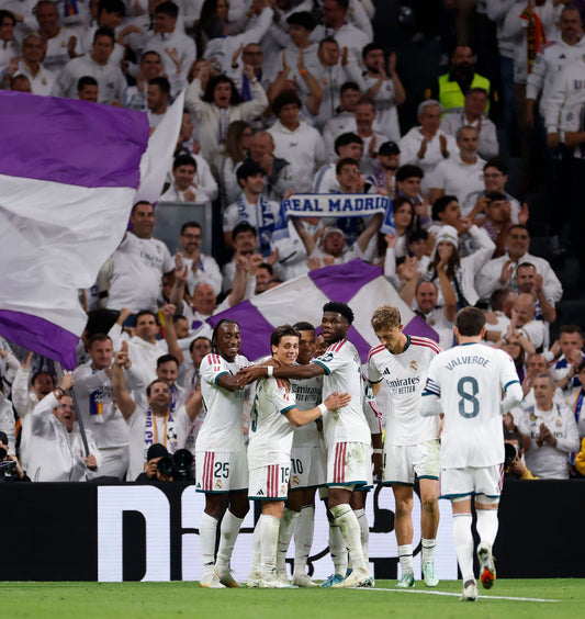 Real Madrid players celebrate against Sevilla at the Santiago Bernabéu on October 18, 2026