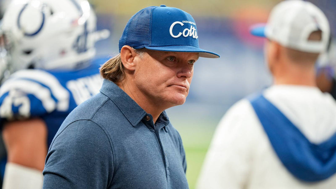 Chris Ballard wearing Indianapolis Colts gear on the sideline