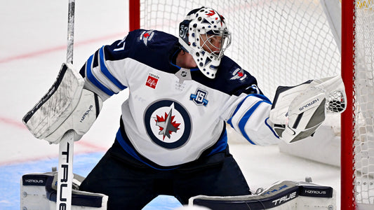 Connor Hellebuyck in goal for the Winnipeg Jets during the 2025-26 season