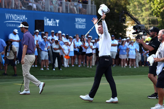 Michael Brennan celebrating his August 2026 Wyndham Championship win, before his October triumph in Japan