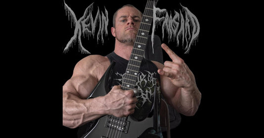 Kevin Frasard posing with a black electric guitar, muscular arms visible against a dark metal-music backdrop
