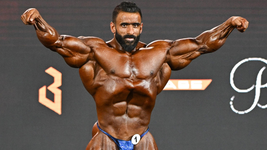 Hadi Choopan posing with sharply defined chest, arms and abdominals at the 2026 Arnold Classic