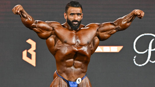 Hadi Choopan posing with sharply defined chest, arms and abdominals at the 2026 Arnold Classic