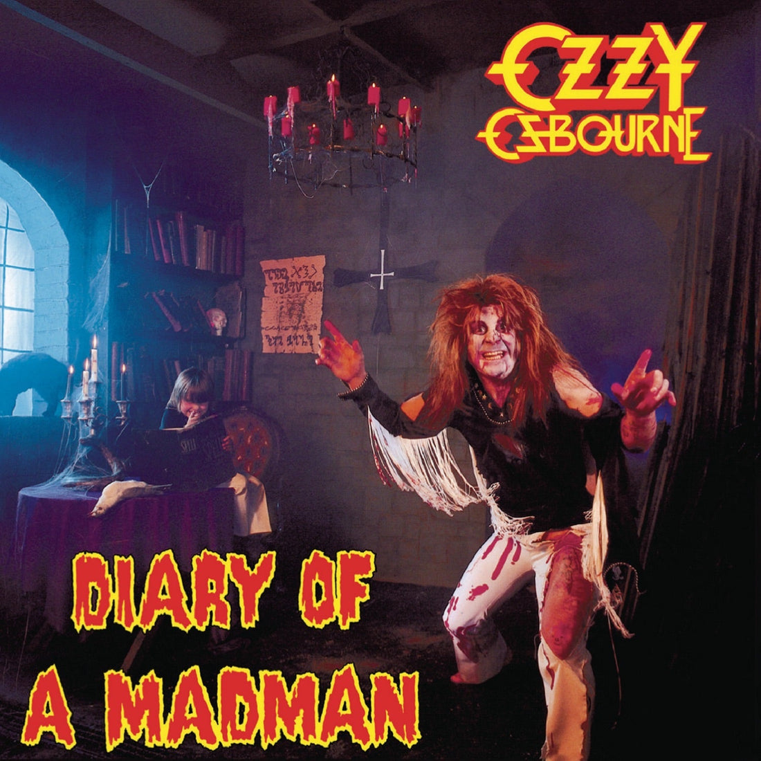 Ozzy Osbourne performing live under dramatic concert lighting