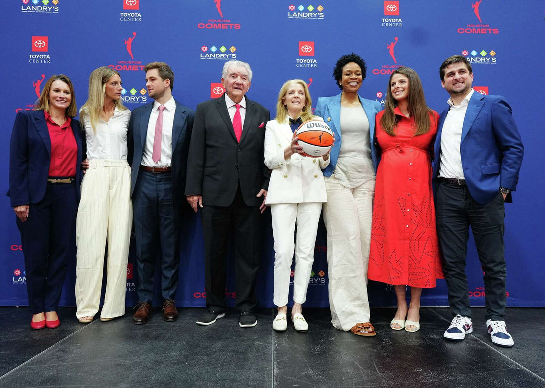 Houston Comets representatives at a 2026 Toyota Center press event marking the franchise's return