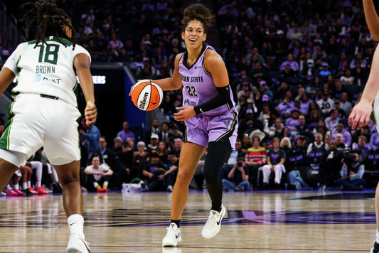 Veronica Burton brings the ball upcourt in a lavender Golden State Valkyries uniform during the 2026 WNBA season
