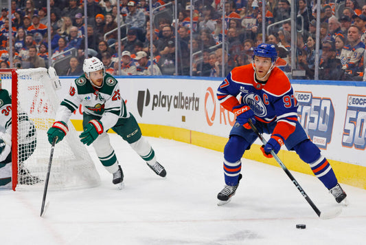 Connor McDavid making a pass against Minnesota Wild on October 20 2026