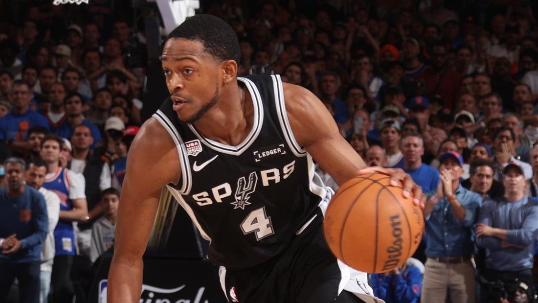 De'Aaron Fox dribbling in a black San Antonio Spurs jersey during the 2026 NBA Finals