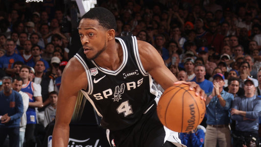 De'Aaron Fox dribbling in a black San Antonio Spurs jersey during the 2026 NBA Finals