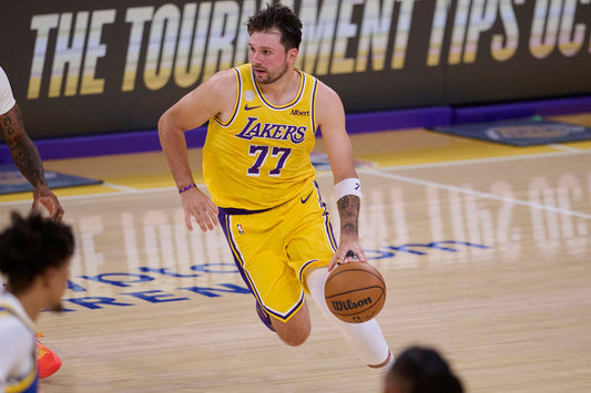 Luka Dončić handles the ball for the Lakers against Golden State on October 21, 2026