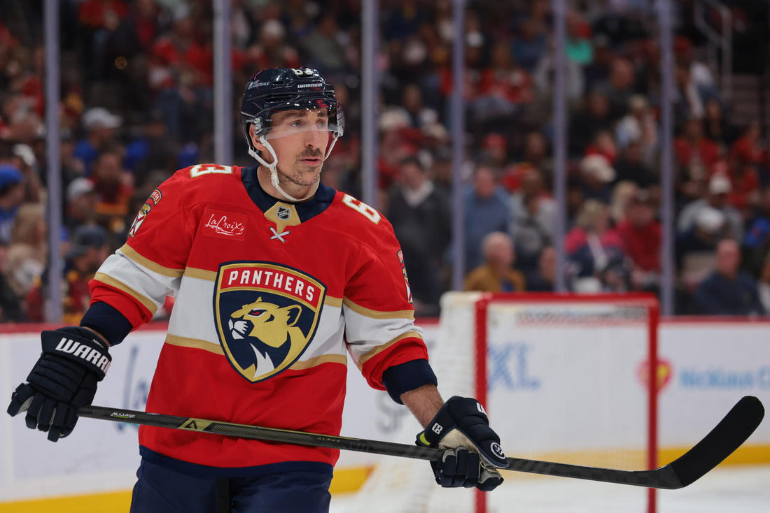 Brad Marchand skating in a red Florida Panthers jersey during the 2025-26 NHL season