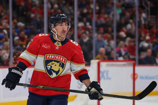 Brad Marchand skating in a red Florida Panthers jersey during the 2025-26 NHL season