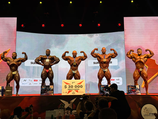 Men's Open medalists posing onstage at the 2025 EVLS Prague Pro awards ceremony