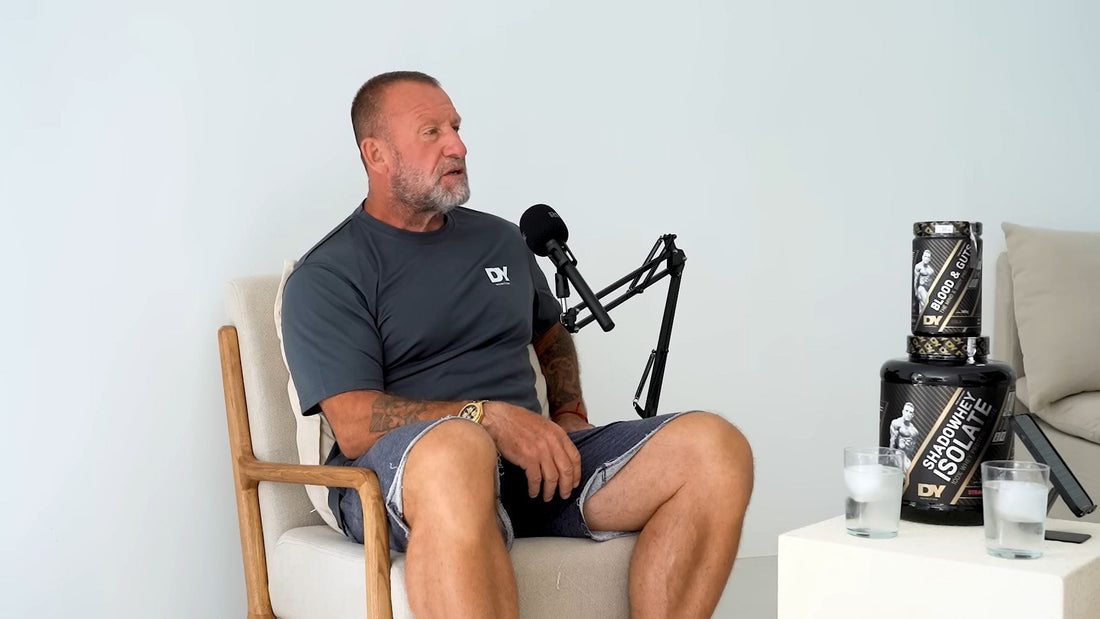 Dorian Yates, six-time Mr. Olympia champion, seated during a bodybuilding interview