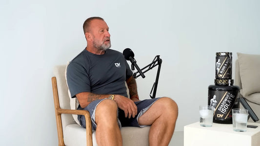 Dorian Yates, six-time Mr. Olympia champion, seated during a bodybuilding interview