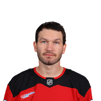 Brett Pesce in his current New Jersey Devils 2026–27 uniform; official player portrait