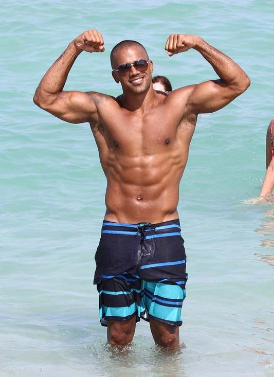 Shemar Moore showing his muscular physique during athletic training