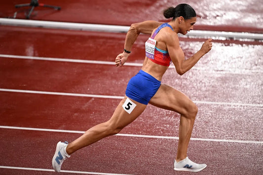 Sydney McLaughlin-Levrone sprinting at full stride in the Tokyo 2025 women's 400m final