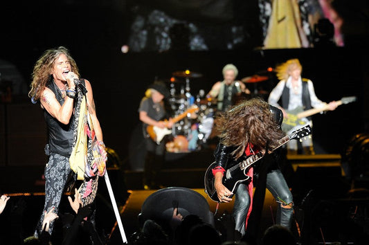 Live performance by Aerosmith with Steven Tyler singing and Joe Perry playing guitar