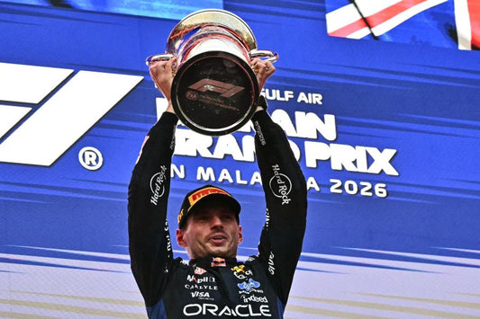 Max Verstappen lifts the winner's trophy after the 2026 Bahrain Grand Prix in Malaysia