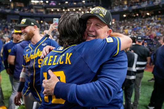 Pat Murphy hugs Sal Frelick during Milwaukee's 2026 World Series celebration