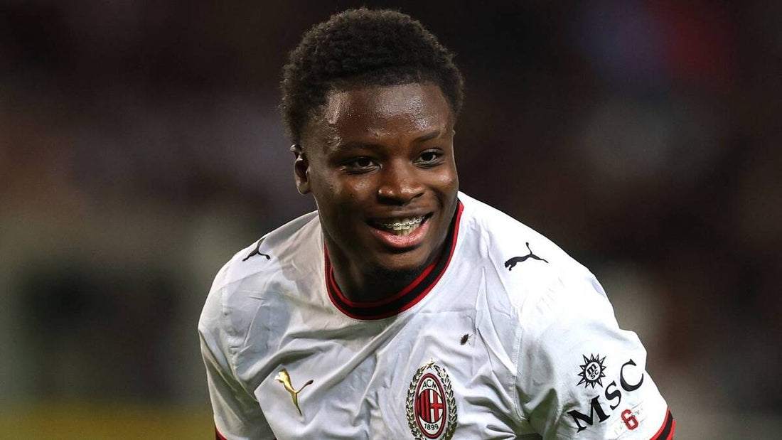 Alphadjo Cissé wearing AC Milan's 2026 away kit