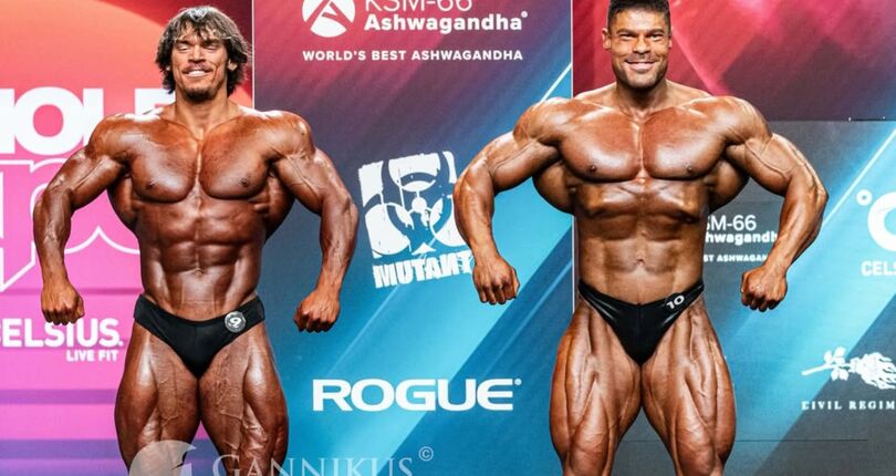 Sam Sulek displaying a deeply defined Classic Physique stage pose at the 2026 Arnold Classic