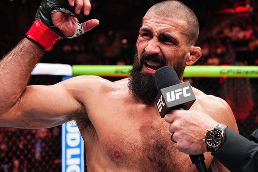 Court McGee speaking in the Octagon during the late stage of his UFC career