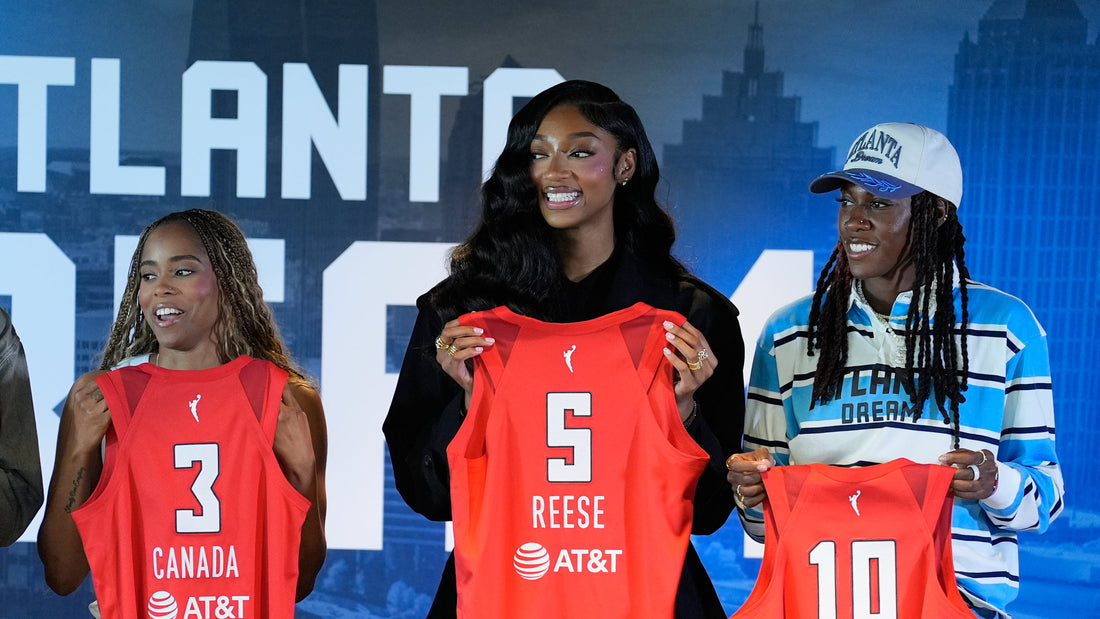 Angel Reese and Jordin Canada showing Atlanta Dream jerseys during 2026 team introduction
