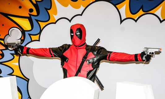Deadpool-inspired gym pump cover hoodie in a heavy strength-training setting