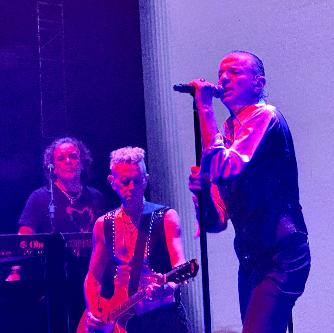 Depeche Mode performing onstage in Denver in 2023