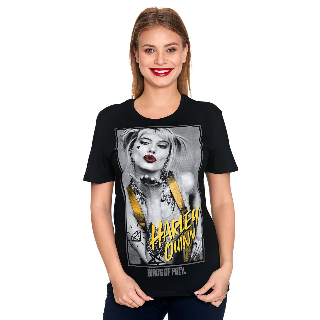 Harley Quinn graphic printed on a black short-sleeve T-shirt worn by a model
