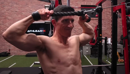 Jeff Cavaliere demonstrating a cable face pull for ATHLEAN-X