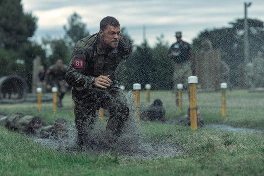 Alan Ritchson running through an obstacle course in the 2026 War Machine film