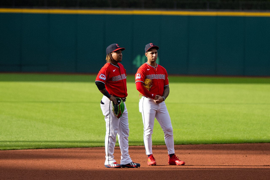 José Ramírez and Brayan Rocchio wearing Cleveland Guardians red uniforms during a 2026 game