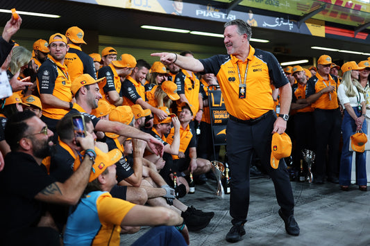 McLaren Racing CEO Zak Brown celebrates with the team in 2025