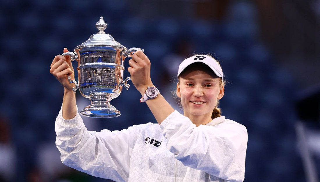 Elena Rybakina holding the 2026 US Open championship trophy in September