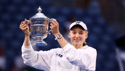 Elena Rybakina holding the 2026 US Open championship trophy in September