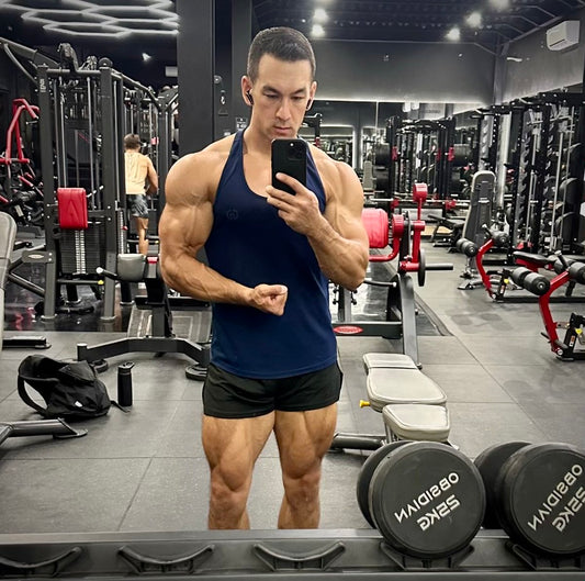 Sean Nalewanyj standing in a gym after strength training, illustrating reps in reserve and controlled lifting effort