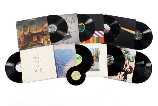 Three Pink Floyd vinyl albums including The Wall, Animals and Wish You Were Here arranged for a classic rock workout comparison