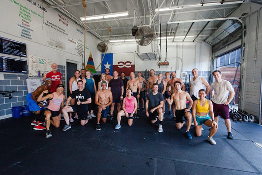 Members posing inside the CrossFit Central gym in Austin, Texas