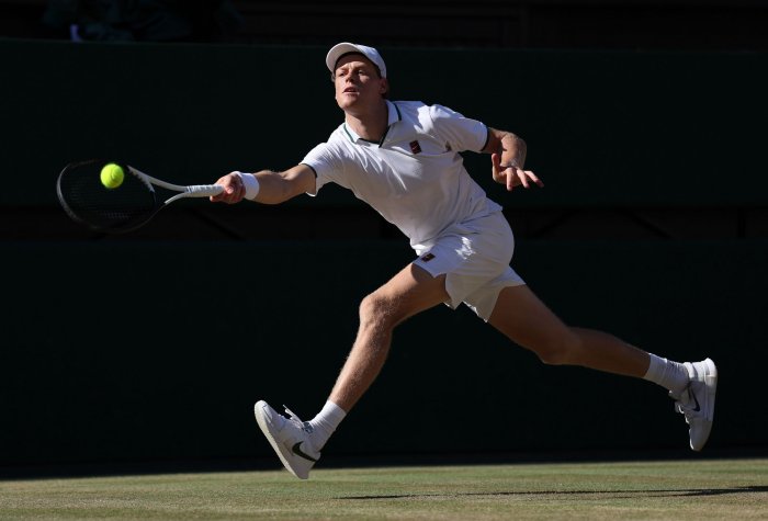 Jannik Sinner playing during his 2026 Wimbledon title run