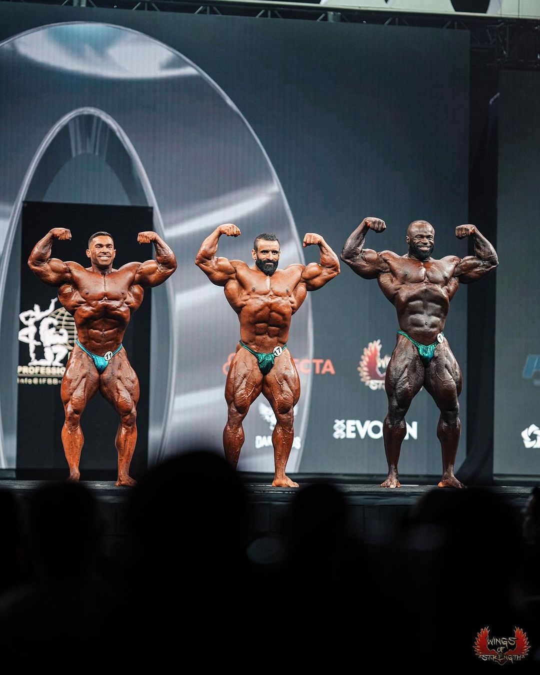 Nick Walker, Derek Lunsford and Samson Dauda compared on a professional bodybuilding stage