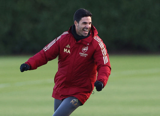 Mikel Arteta on an Arsenal training pitch, illustrating his active strength-and-performance routine
