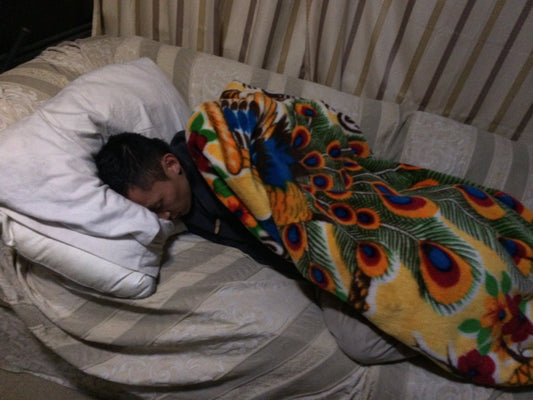 Sleeping person illustrating overnight recovery for lifters