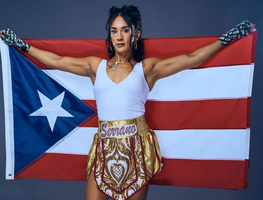 Amanda Serrano with the Puerto Rican flag during her 2026 boxing campaign