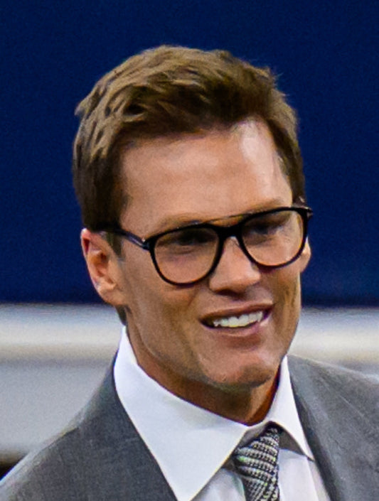 Tom Brady photographed in 2025 for an article about his new robotic massage routine