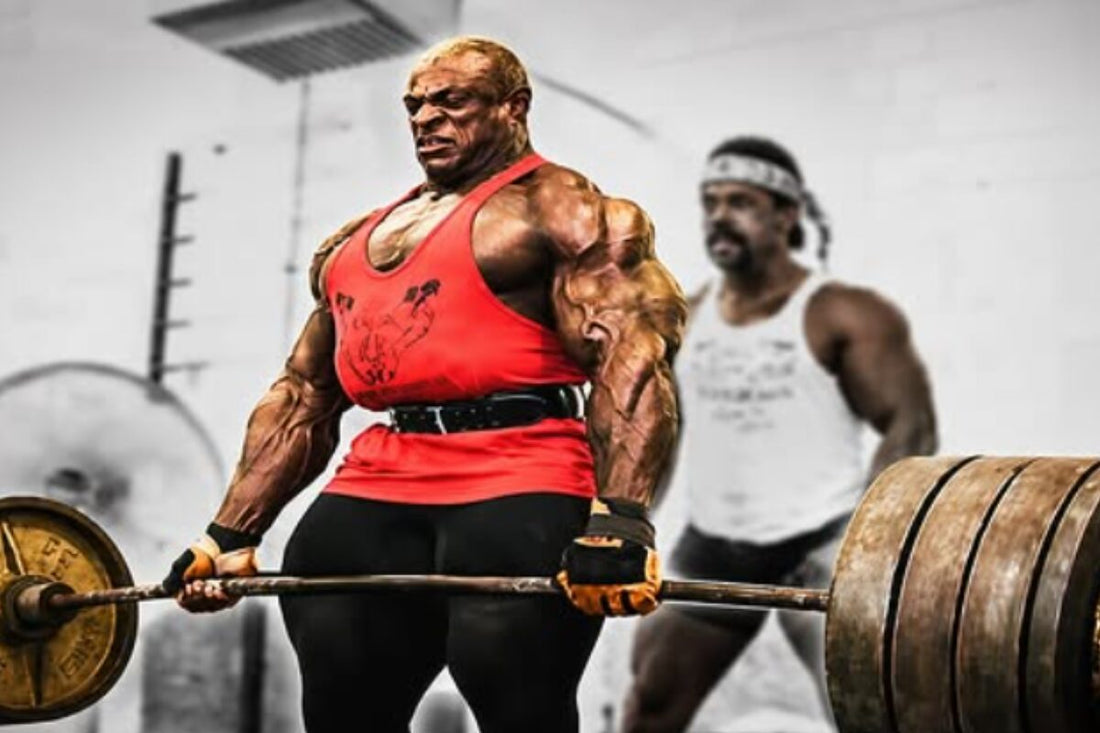 Ronnie Coleman lifting a heavily loaded barbell at a gym during a deadlift