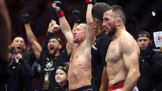 Petr Yan celebrates retaining his UFC bantamweight title against Merab Dvalishvili